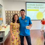 Jessica with ScrubDaddy founder at a workplace wellness event.